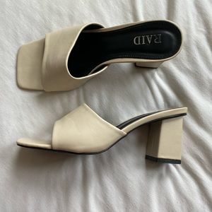 White heeled sandals